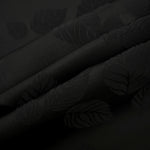 Lightweight black botanical leaf print viscose fabric for dressmaking