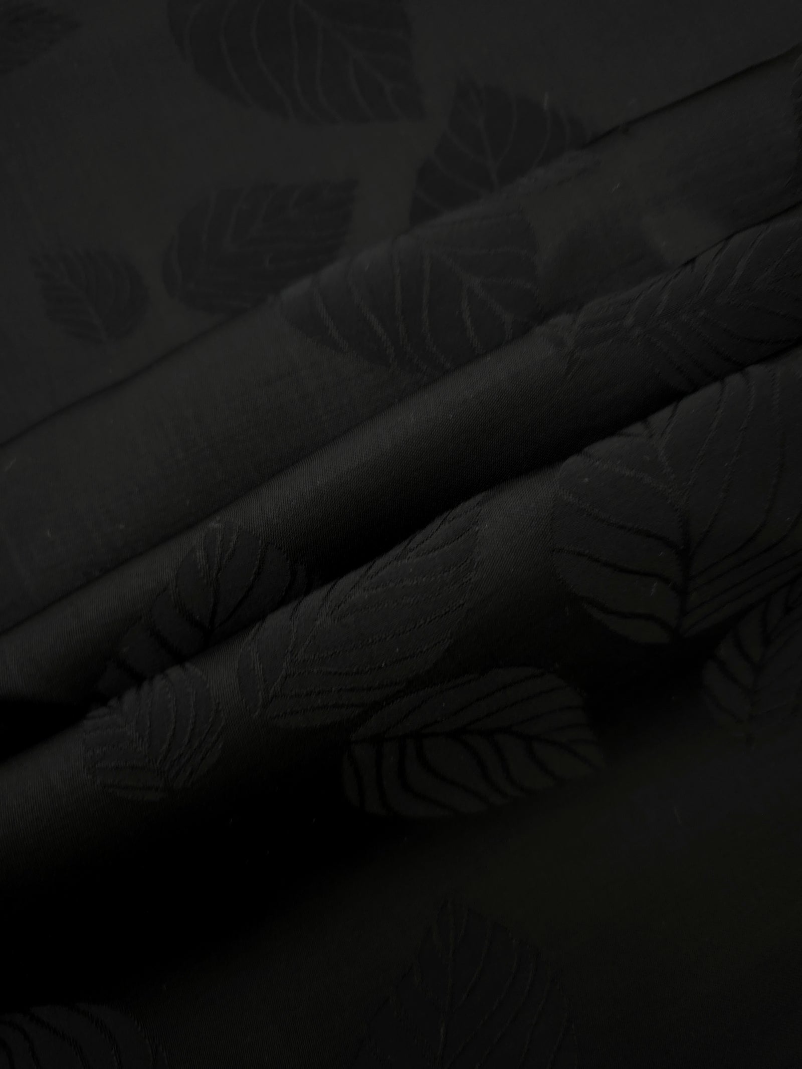 Lightweight black botanical leaf print viscose fabric for dressmaking