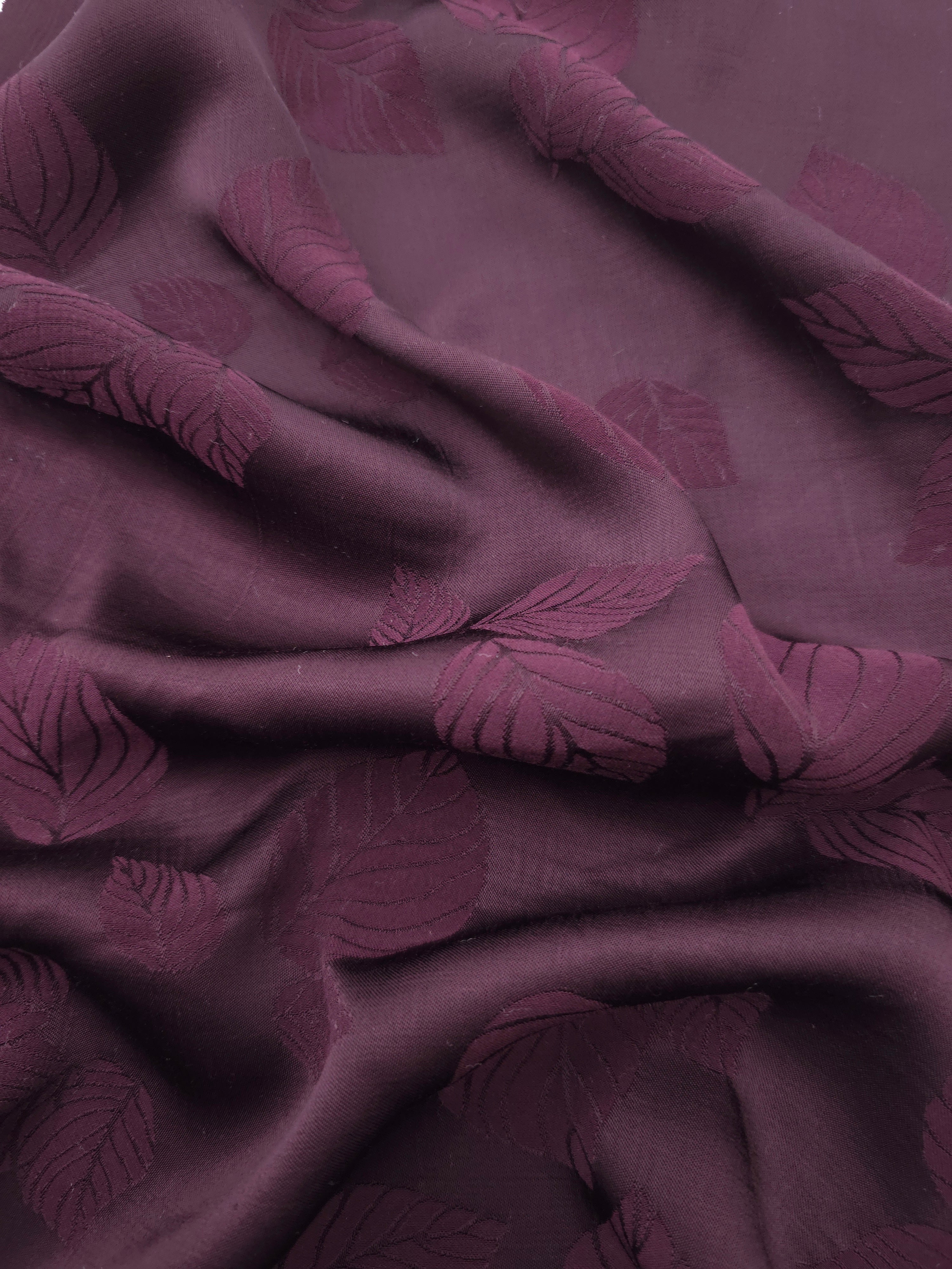 Cherry burgundy botanical leaf print viscose fabric with fluid drape