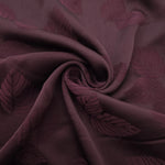 Lightweight cherry burgundy botanical leaf print viscose dressmaking fabric