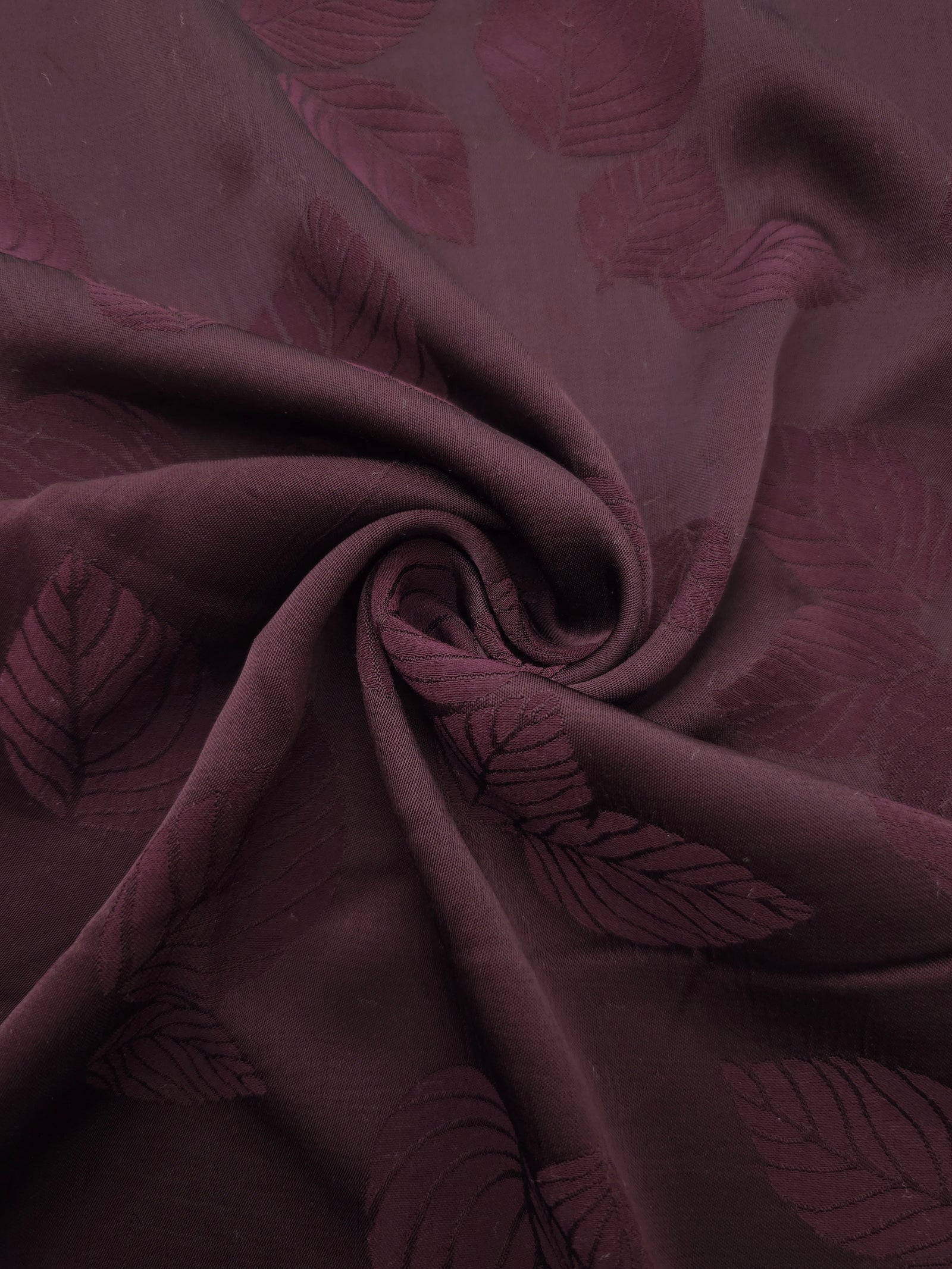 Lightweight cherry burgundy botanical leaf print viscose dressmaking fabric