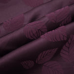 Cherry burgundy botanical leaf print fabric detail showing organic pattern