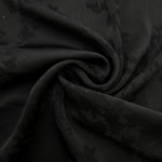 Lightweight black petal flower print viscose fabric for dressmaking