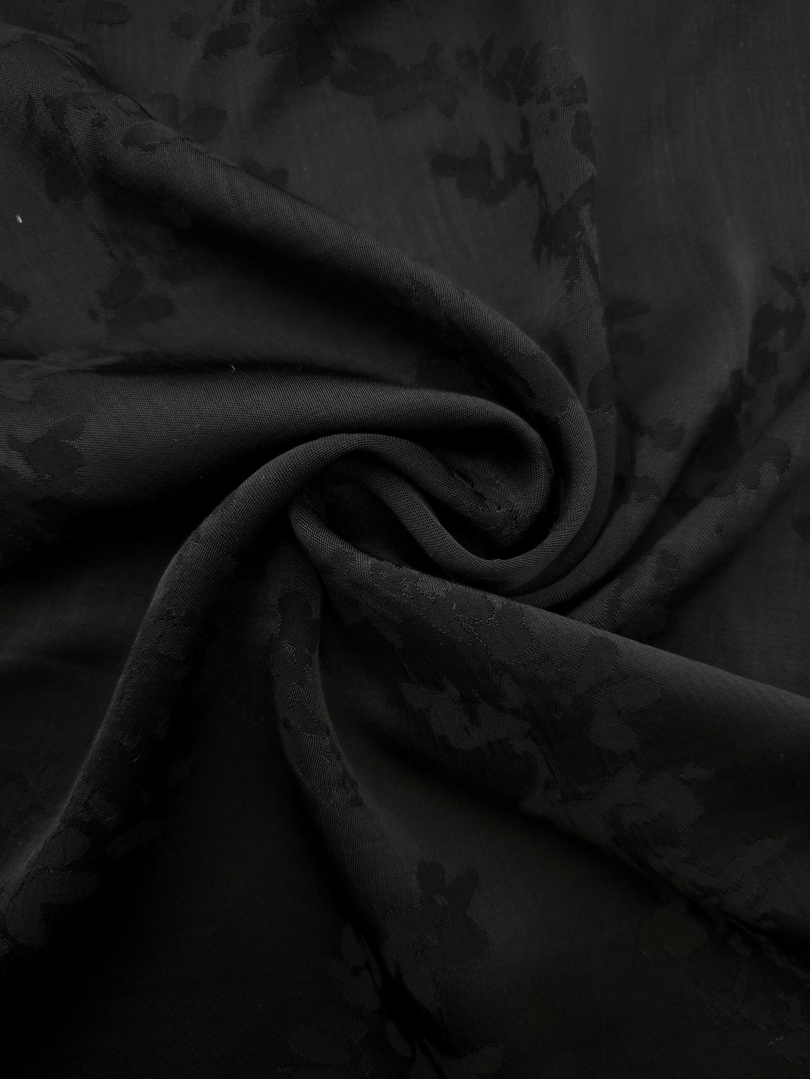 Lightweight black petal flower print viscose fabric for dressmaking