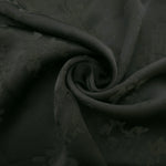Lightweight dark green petal flower print viscose dressmaking fabric