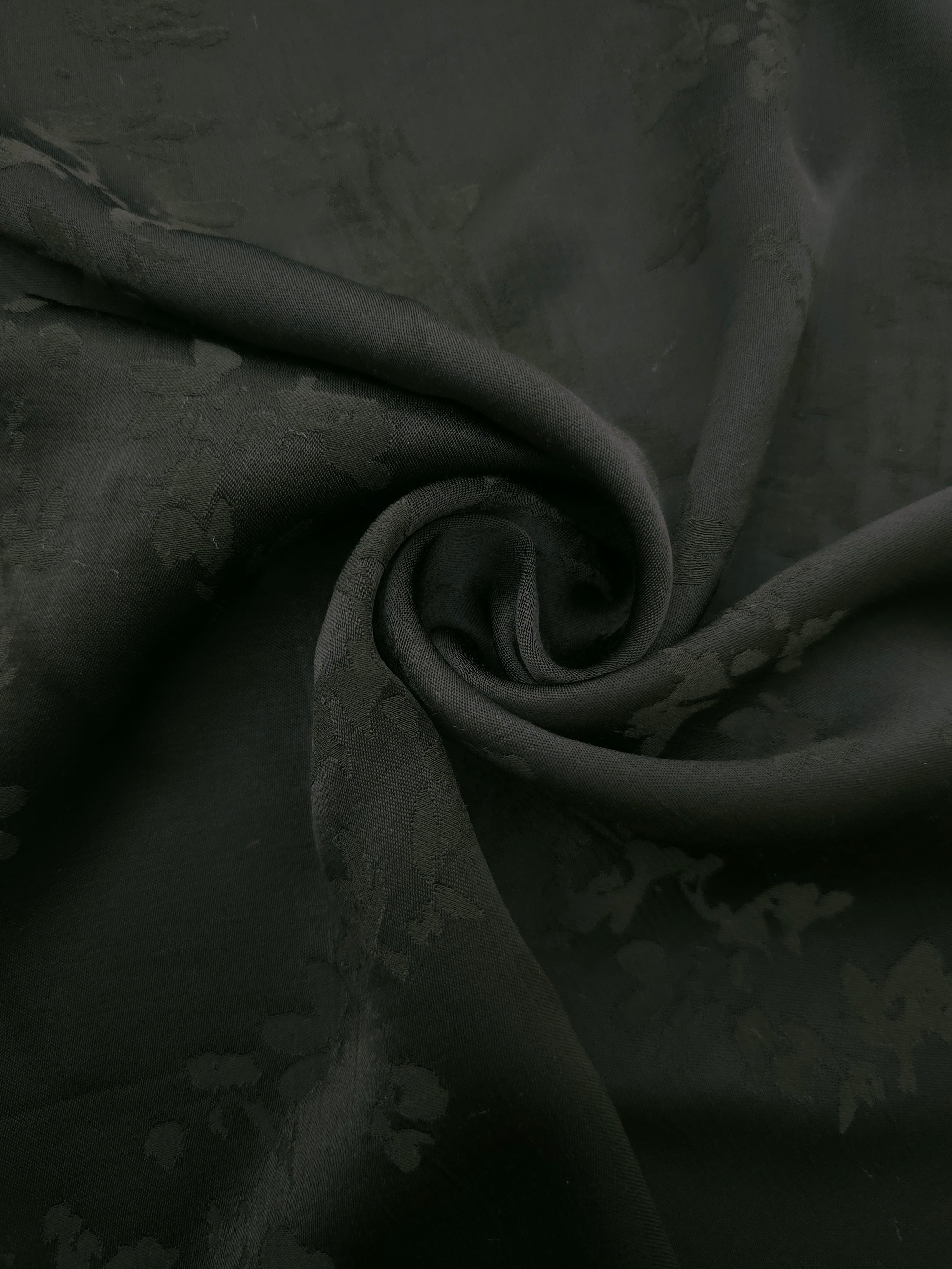 Lightweight dark green petal flower print viscose dressmaking fabric