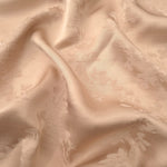 Warm beige petal flower print viscose fabric with fluid garment drape