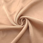 Lightweight warm beige 100% viscose garment fabric for dressmaking