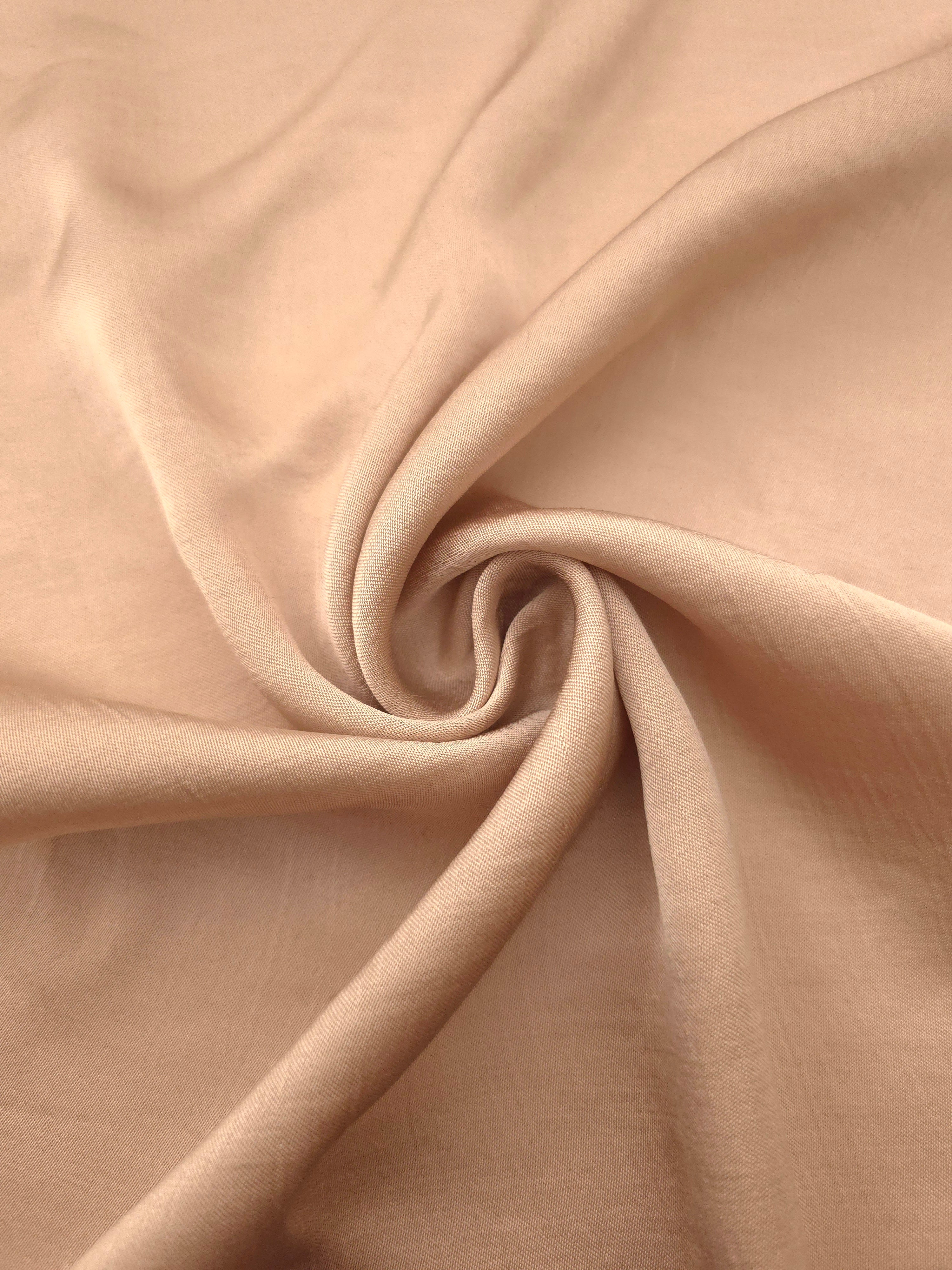 Lightweight warm beige 100% viscose garment fabric for dressmaking