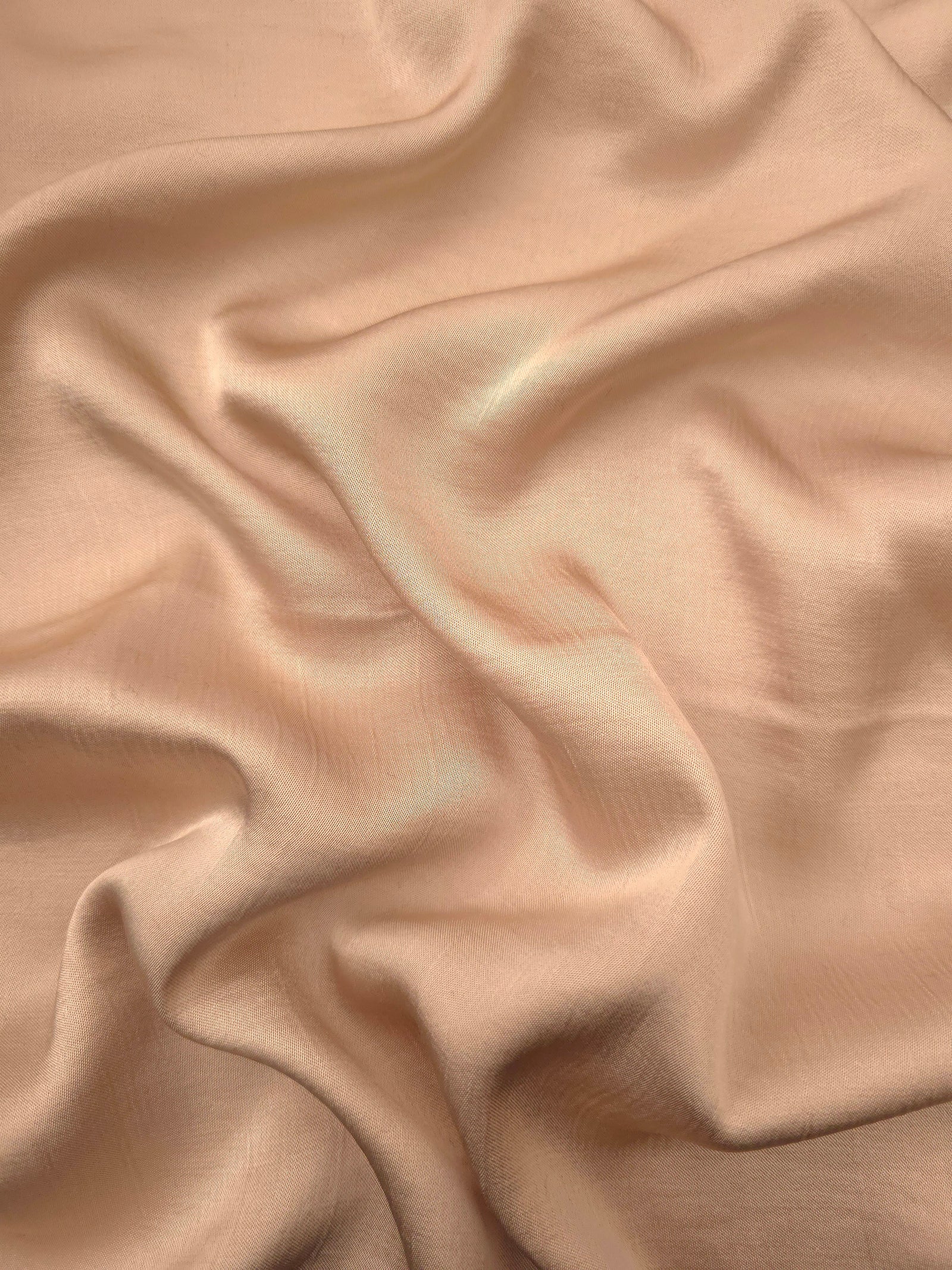 Warm beige plain 100% viscose fabric for modest dresses and flowing apparel