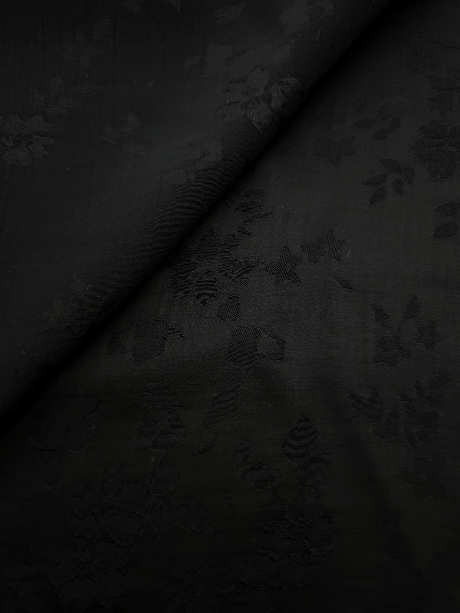 Black stylized leaf print viscose fabric for modest dresses and apparel