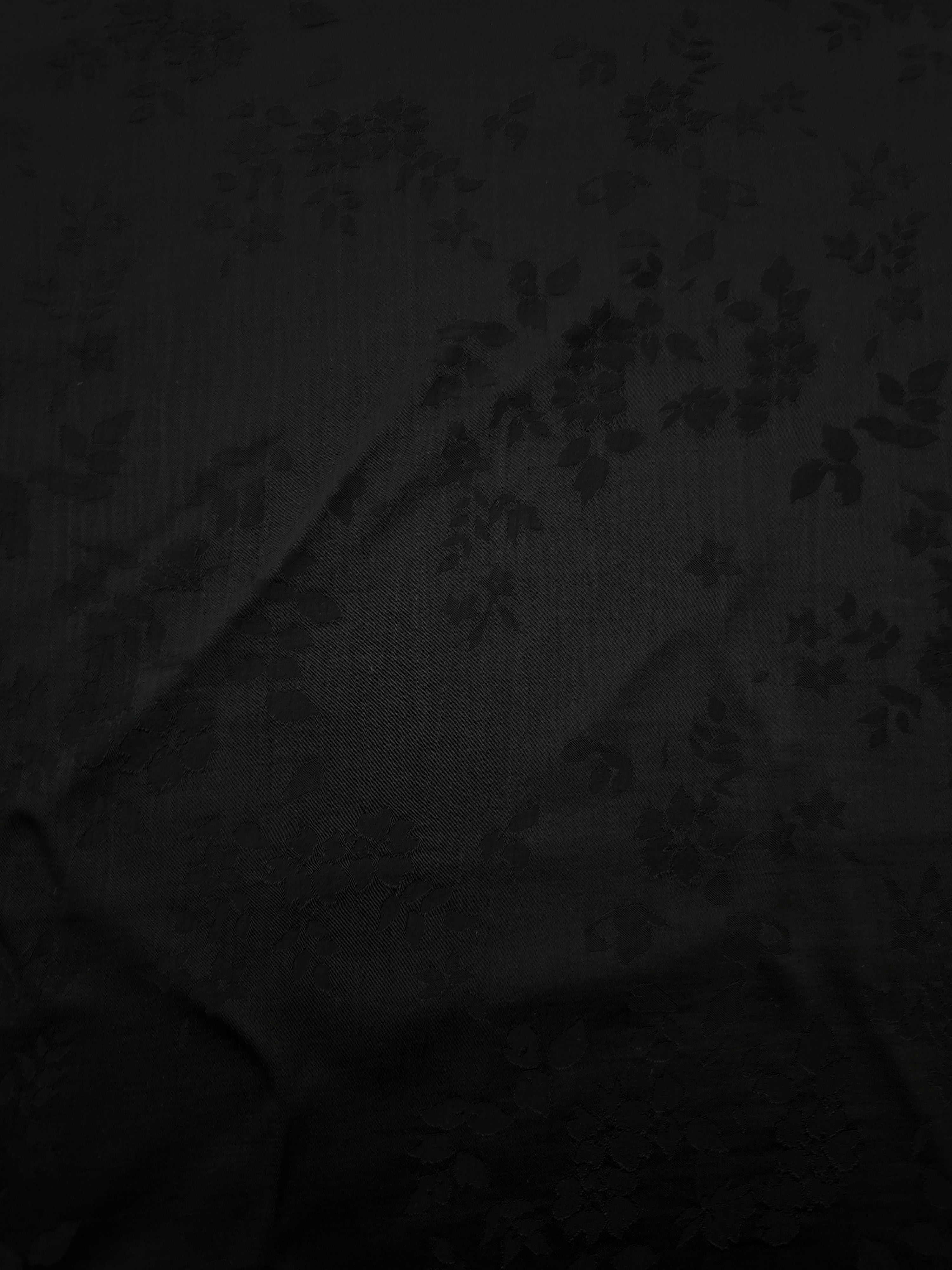 Soft drape black stylized leaf print viscose dress fabric