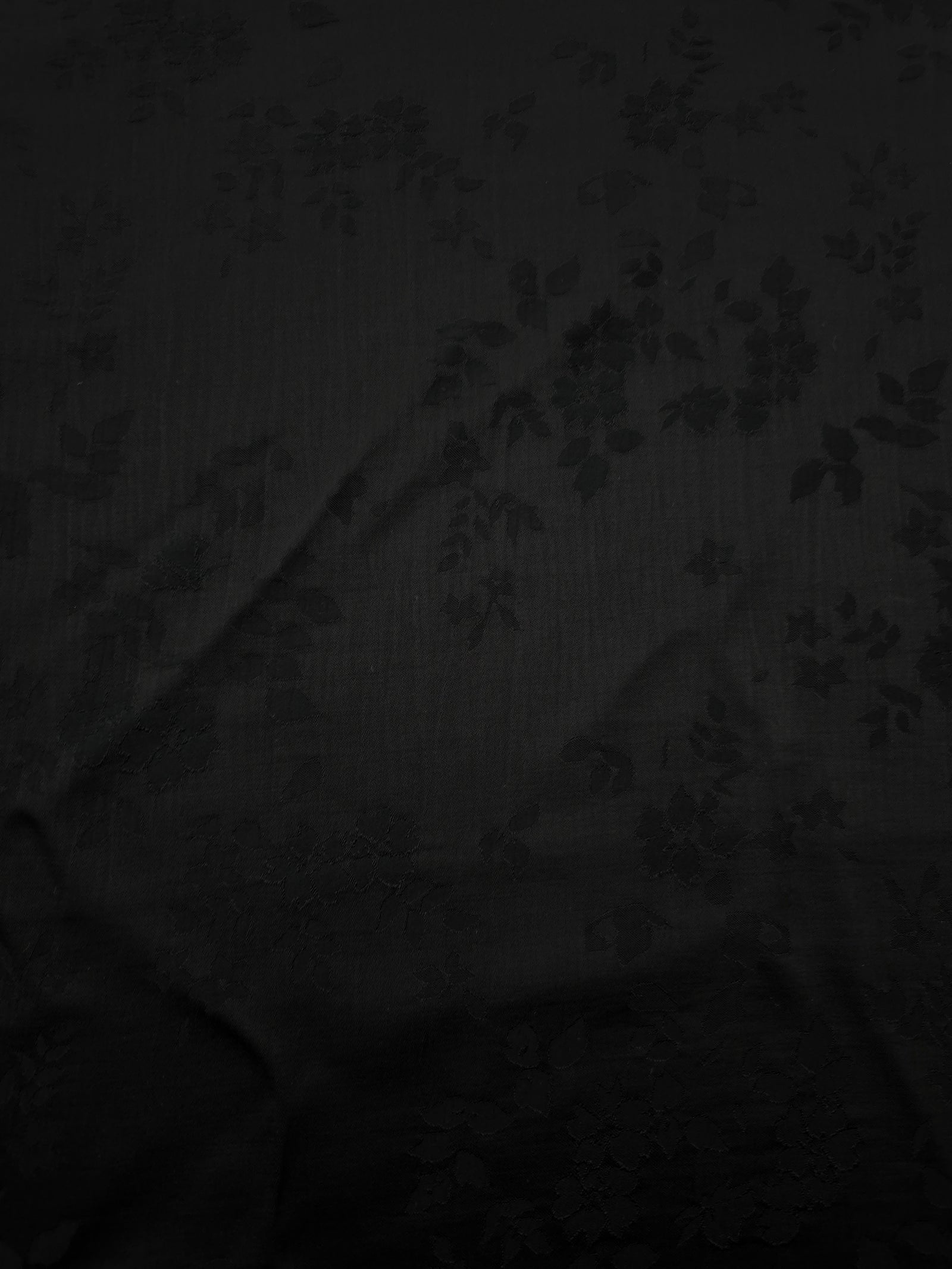 Soft drape black stylized leaf print viscose dress fabric