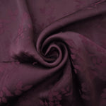 Lightweight cherry burgundy stylized leaf print viscose dressmaking fabric
