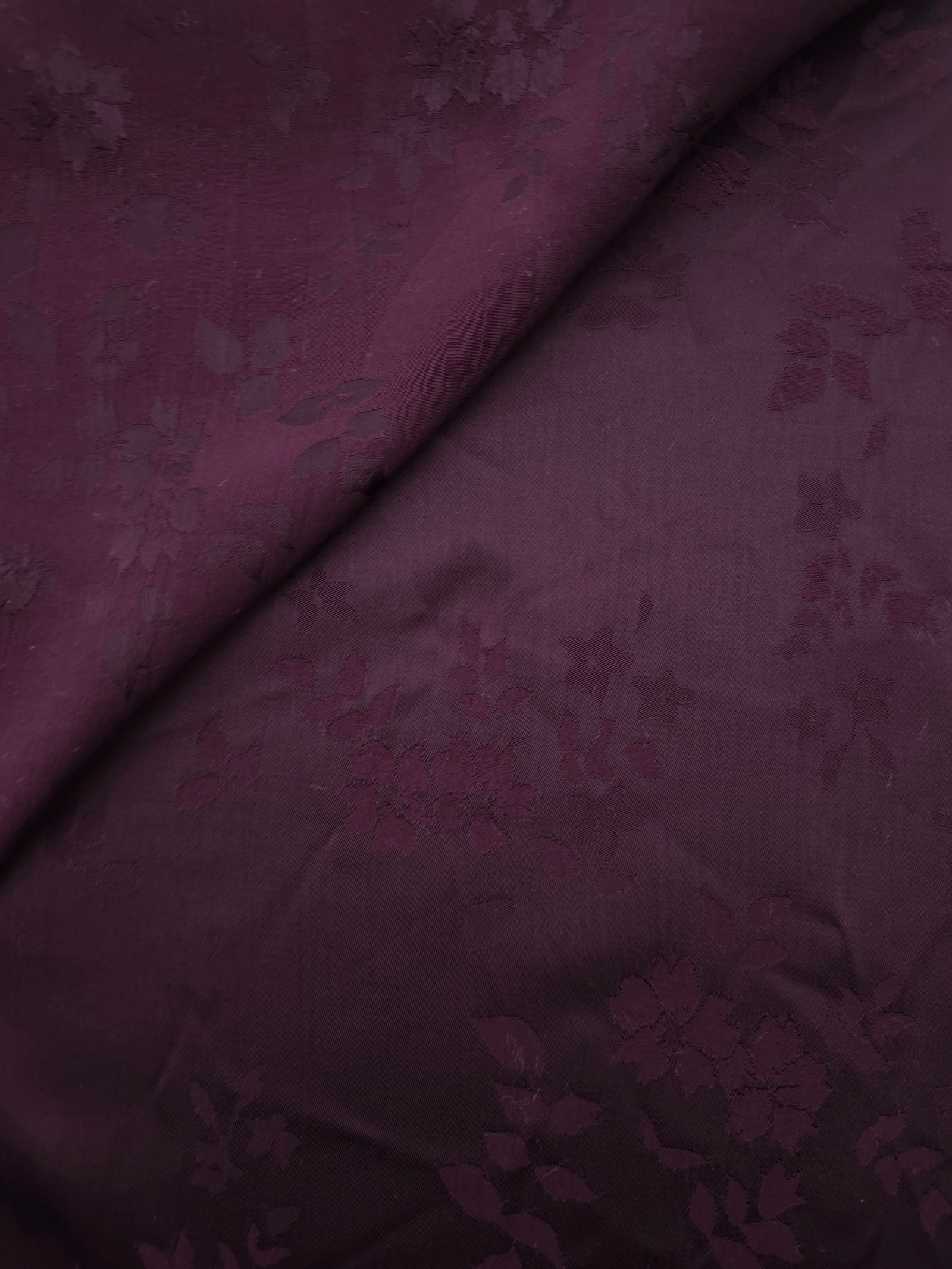 Cherry burgundy stylized leaf viscose fabric for modest dresses and apparel