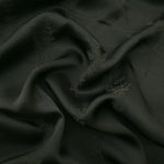 Dark green wild tree botanical print viscose fabric with flowing drape