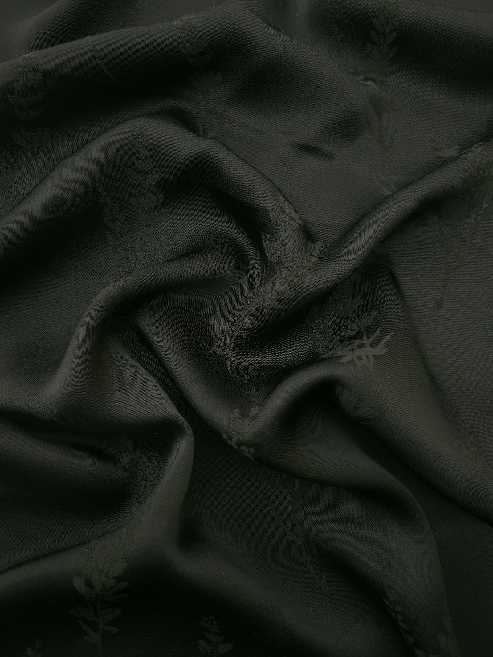 Dark green wild tree botanical print viscose fabric with flowing drape