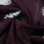 Draped viscose embossed jacquard showing soft movement for blouses and skirts.