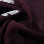 Full fabric view of two-tone jacquard for dressmaking and overlays.