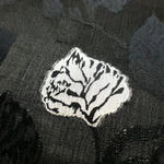 Close view of soft textured viscose jacquard for blouse and skirt sewing.