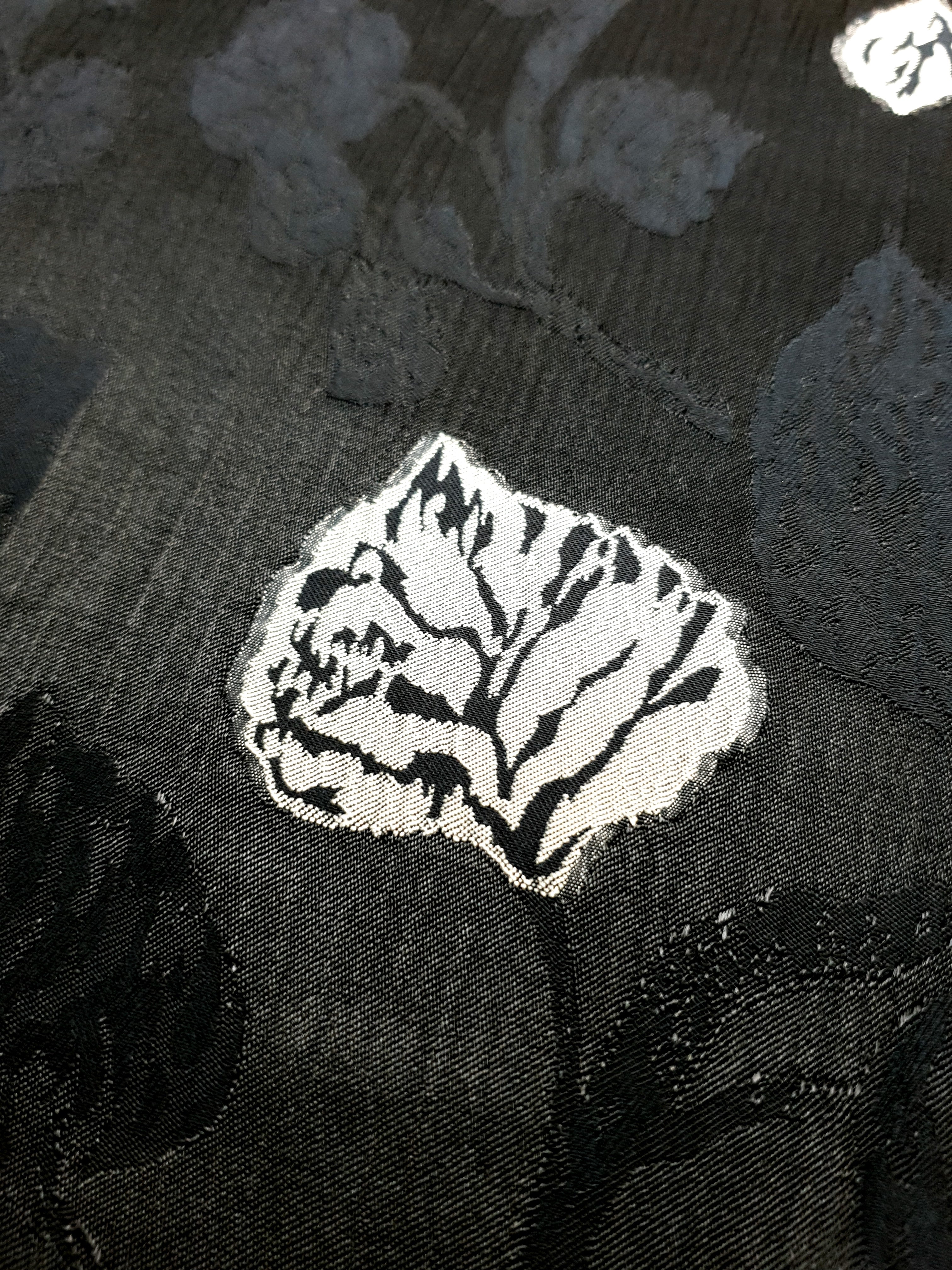 Close view of soft textured viscose jacquard for blouse and skirt sewing.