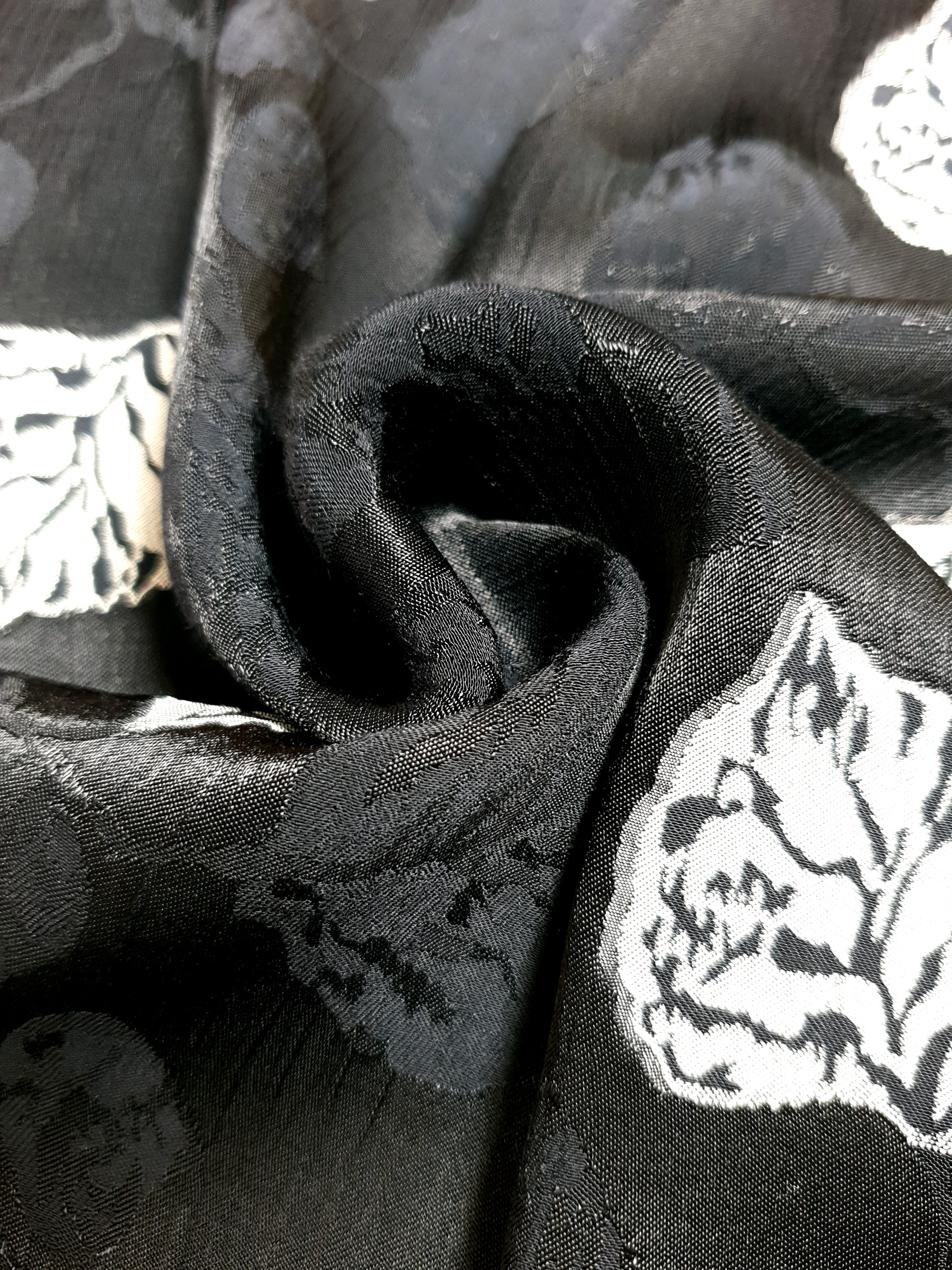 Design detail of woven jacquard with two-tone embossed surface.