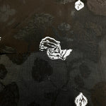 Two-tone viscose jacquard detail for layered dresses and garment panels.