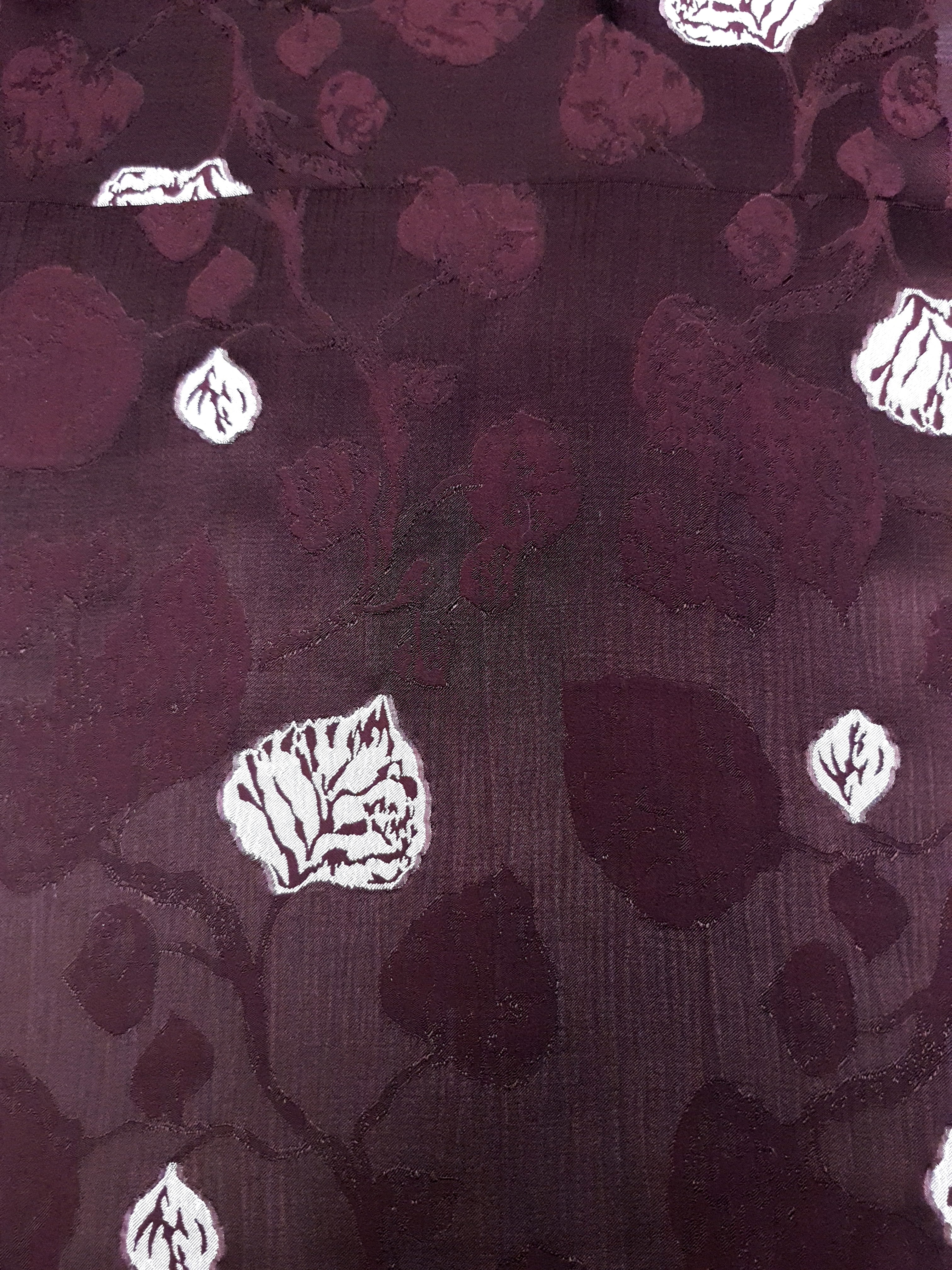 Soft woven viscose jacquard detail with textured hand and tonal depth.
