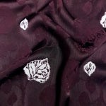 Drape view of viscose jacquard fabric for dresses, blouses and overlays.