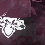 Embossed jacquard texture view for raised leaf dress fabric.