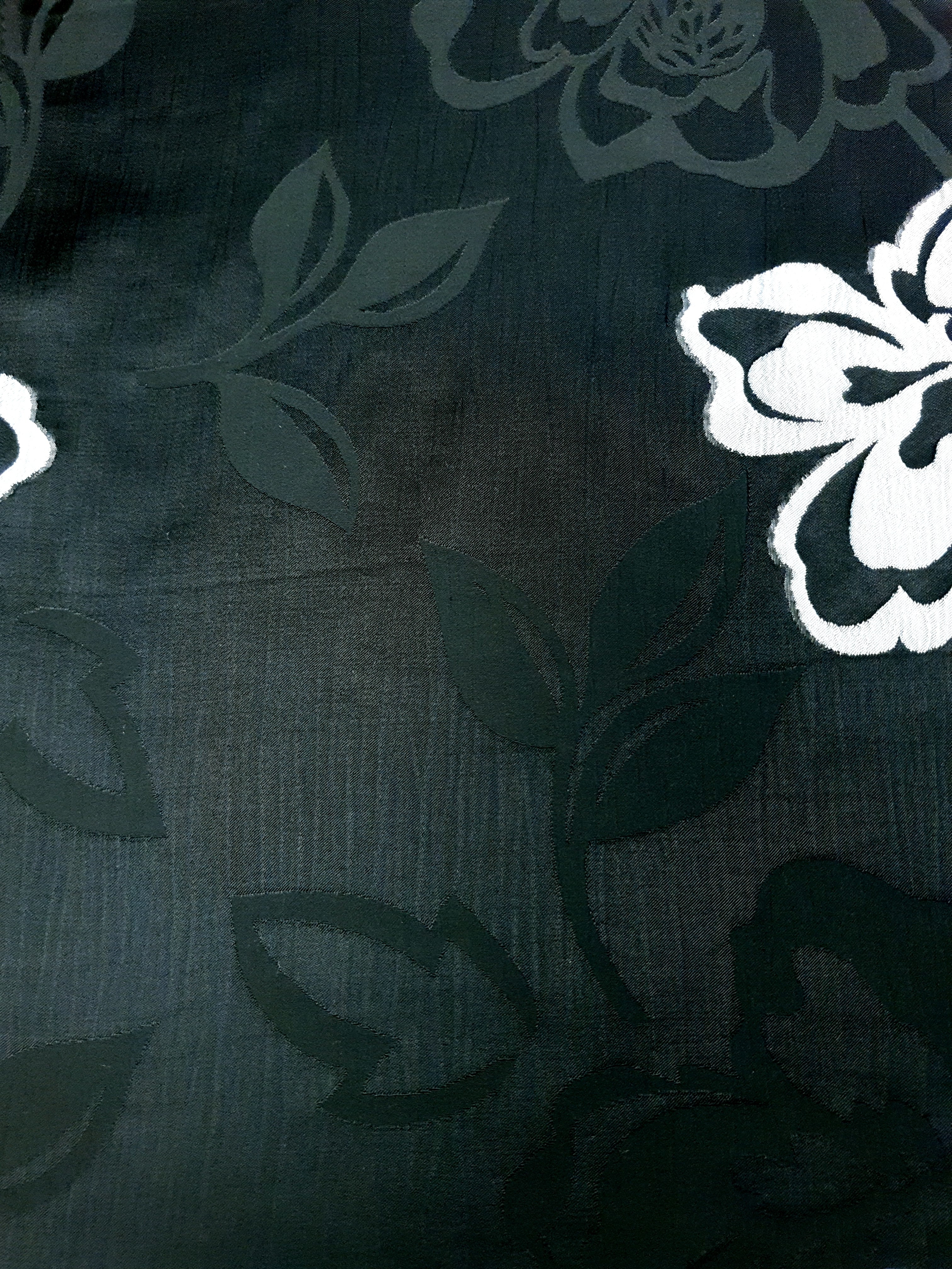 Close view of soft viscose jacquard fabric for dresses and layers.