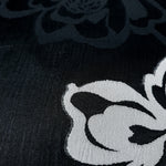Close texture view of rayon viscose jacquard with embossed two-tone finish.