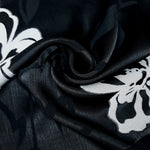 Drape shot of embossed jacquard fabric for dresses and soft jackets.