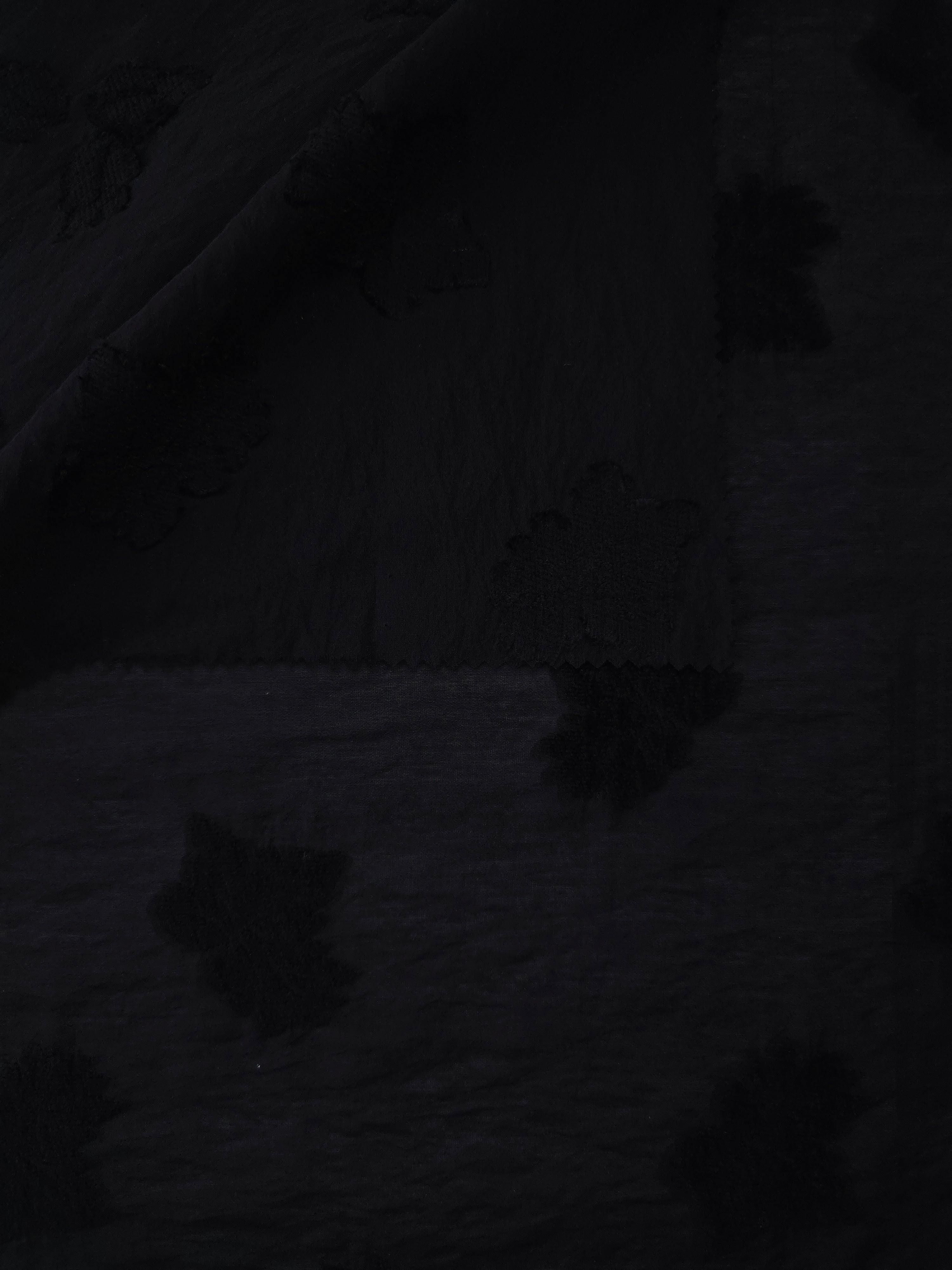 Front and back view of formal black big leaf embossed viscose jacquard fabric.