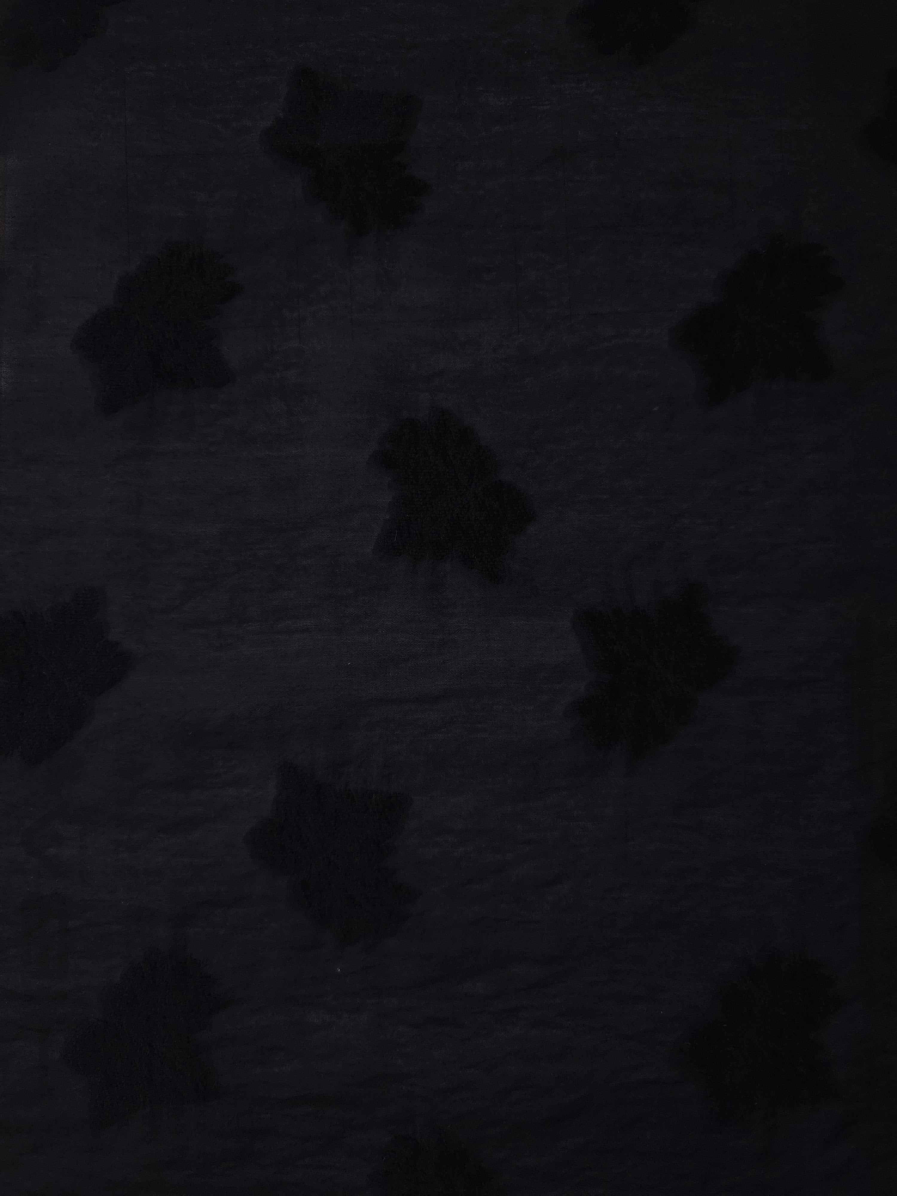 Wide view of formal black big leaf embossed viscose jacquard fabric with tonal raised motif.