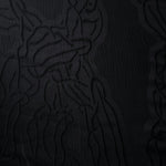 Black laurel polyester crepe jacquard fabric in a textured drape for dresses and jackets.
