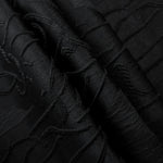 Full view of black laurel polyester crepe jacquard fabric with tonal raised texture.