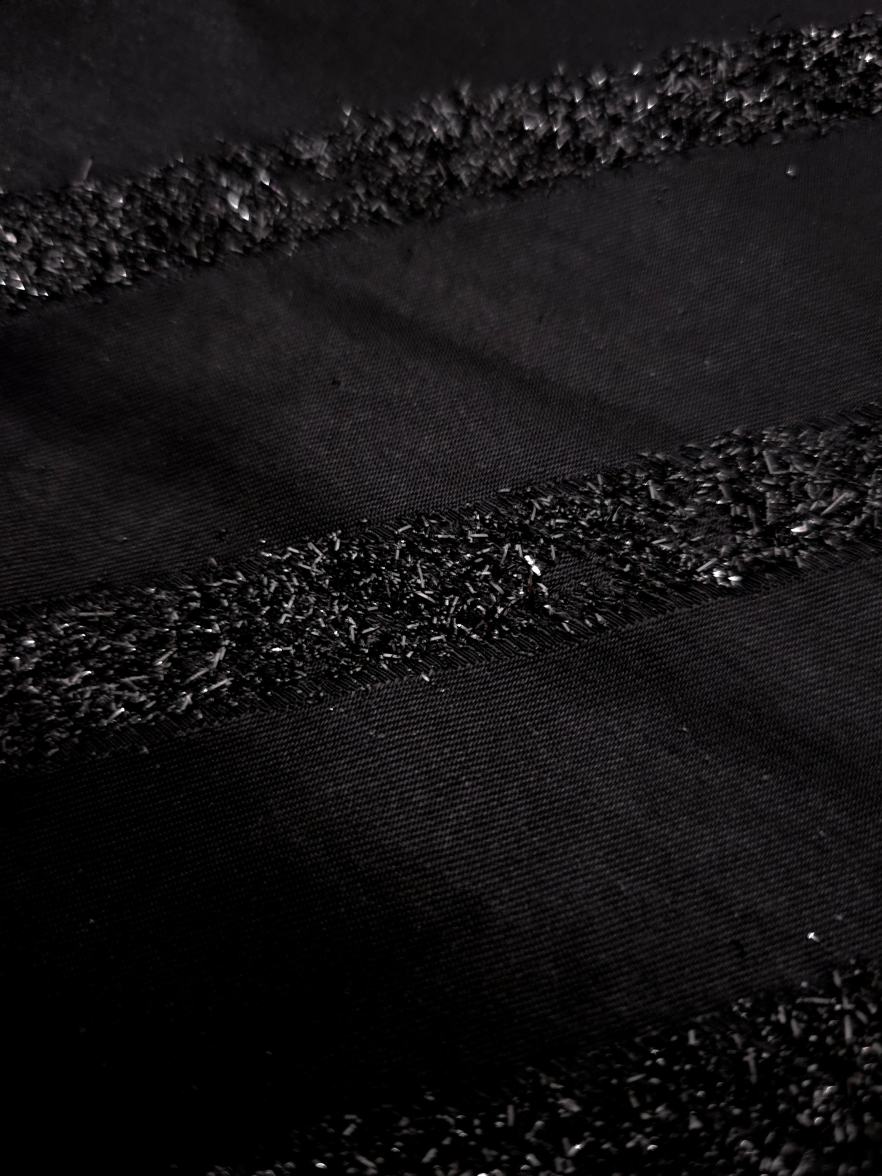 Draped Metallic Black viscose jacquard with fine metallic pinstripe lines