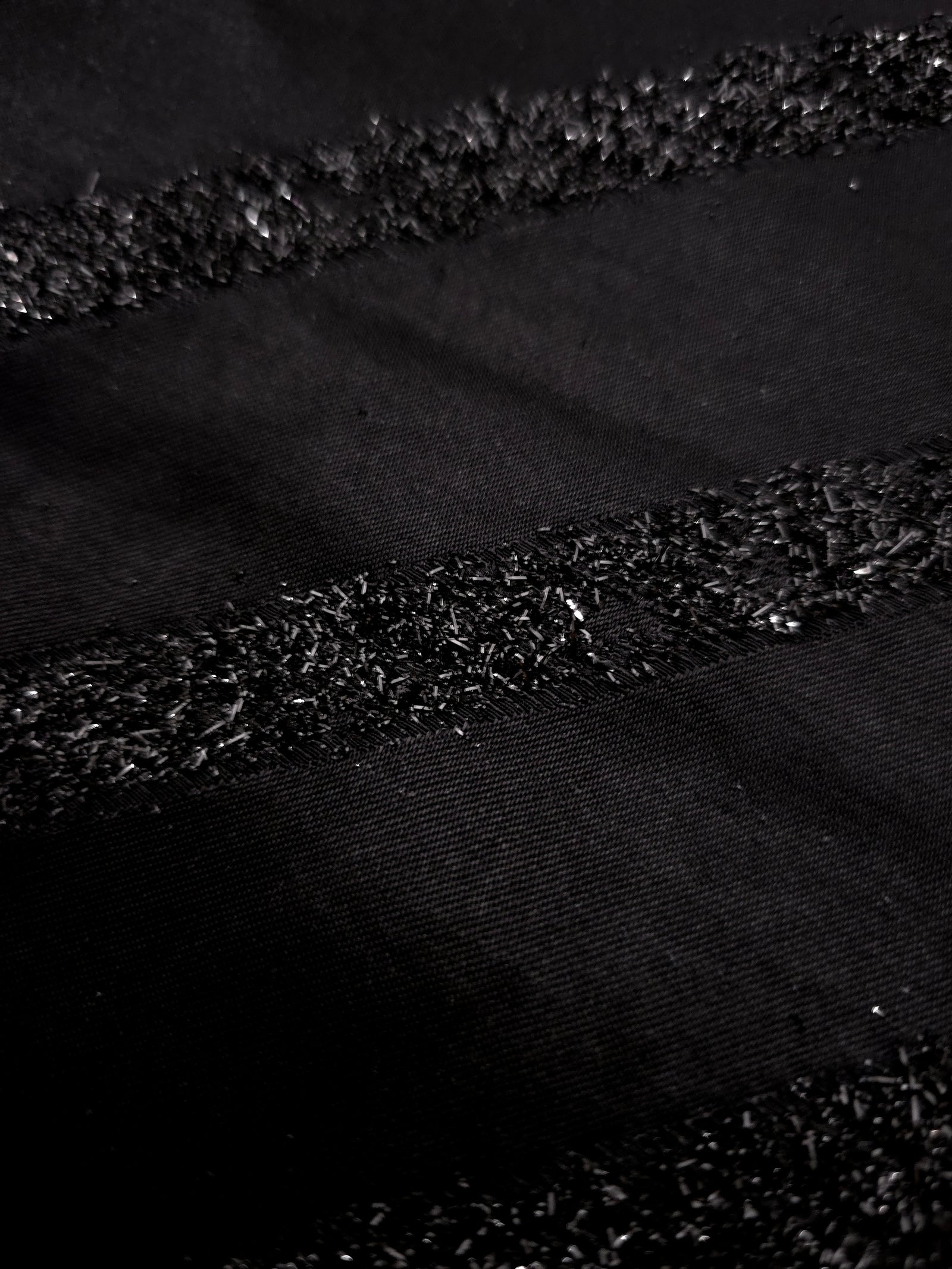 Draped Metallic Black viscose jacquard with fine metallic pinstripe lines