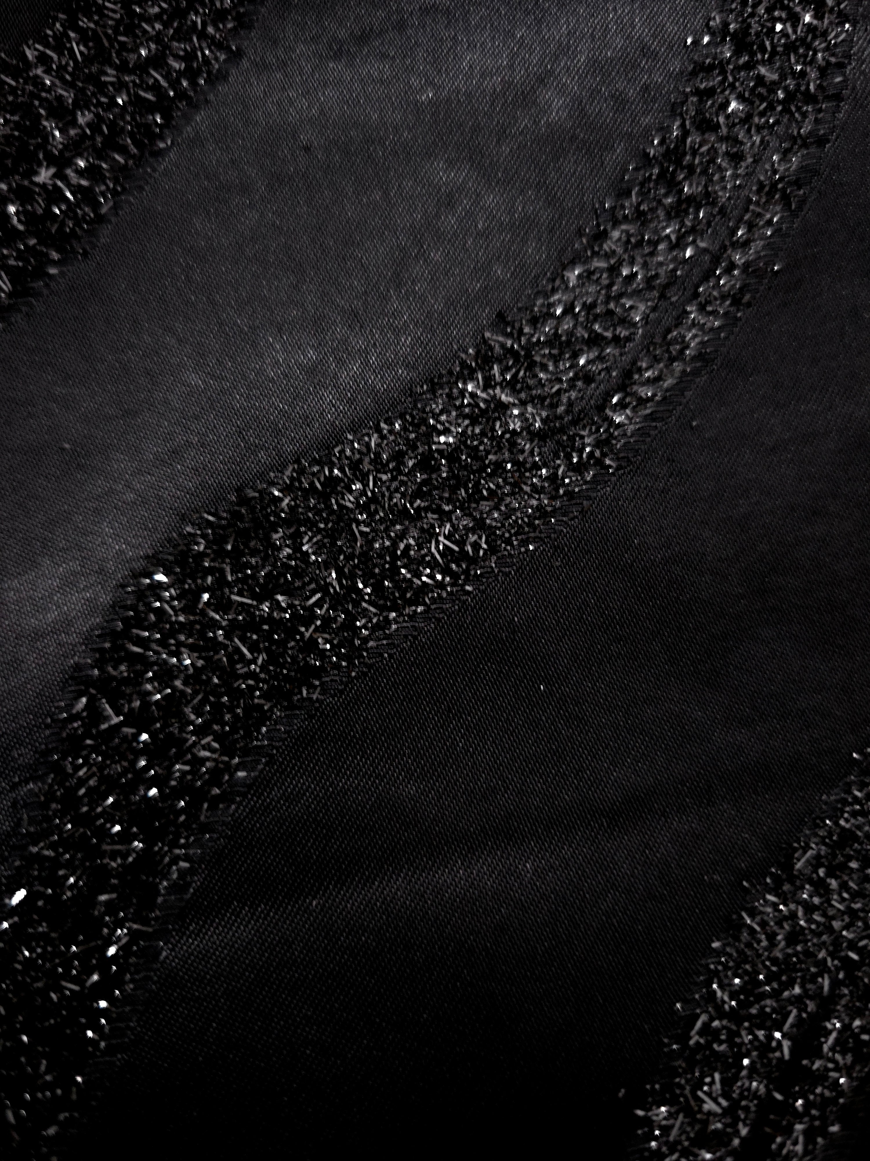 Draped Metallic Black viscose jacquard with flowing reflective wave stripes