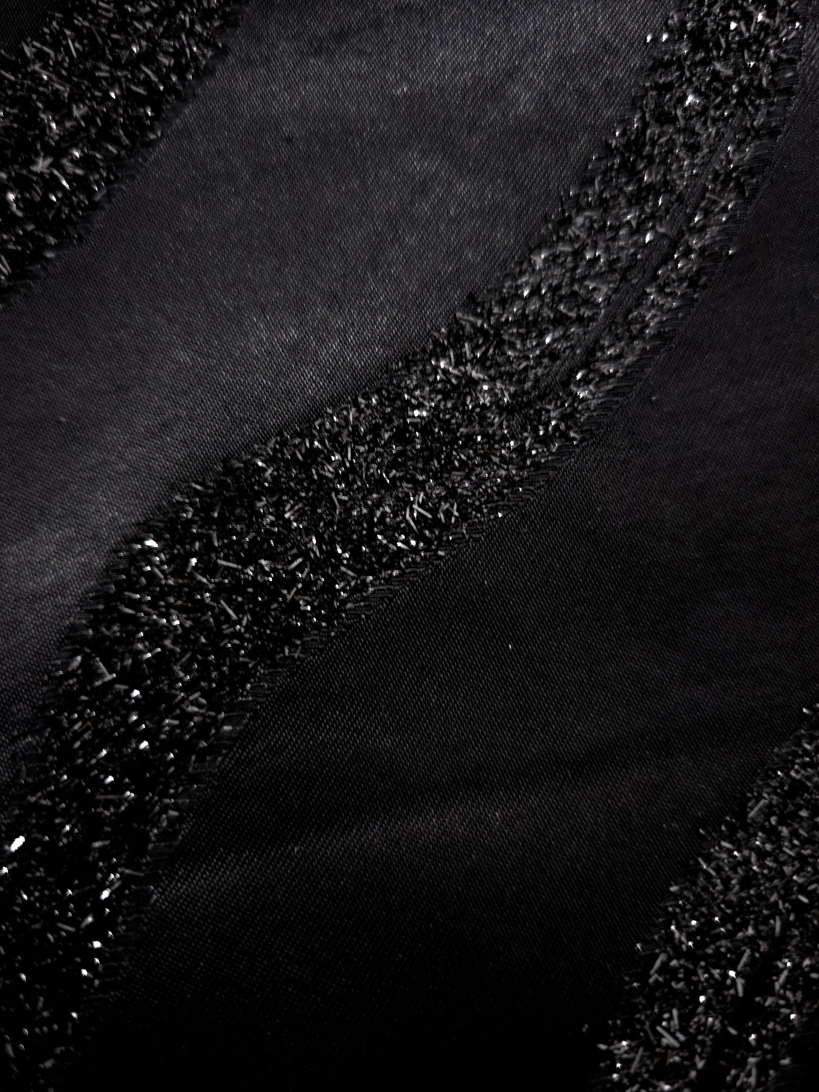 Draped Metallic Black viscose jacquard with flowing reflective wave stripes