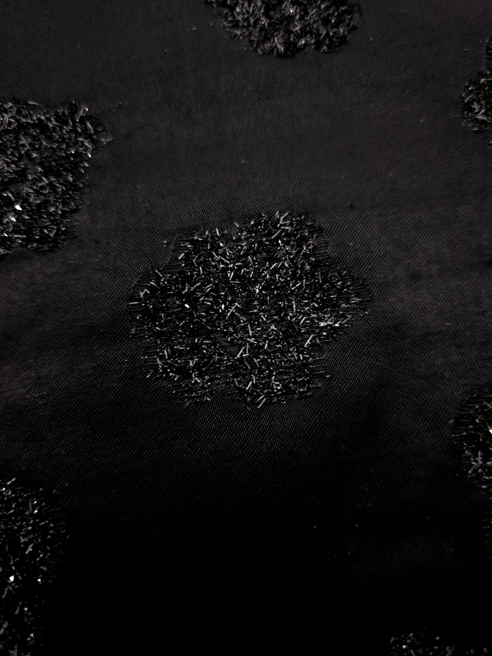 Draped Metallic Black viscose jacquard with irregular reflective pebble dots