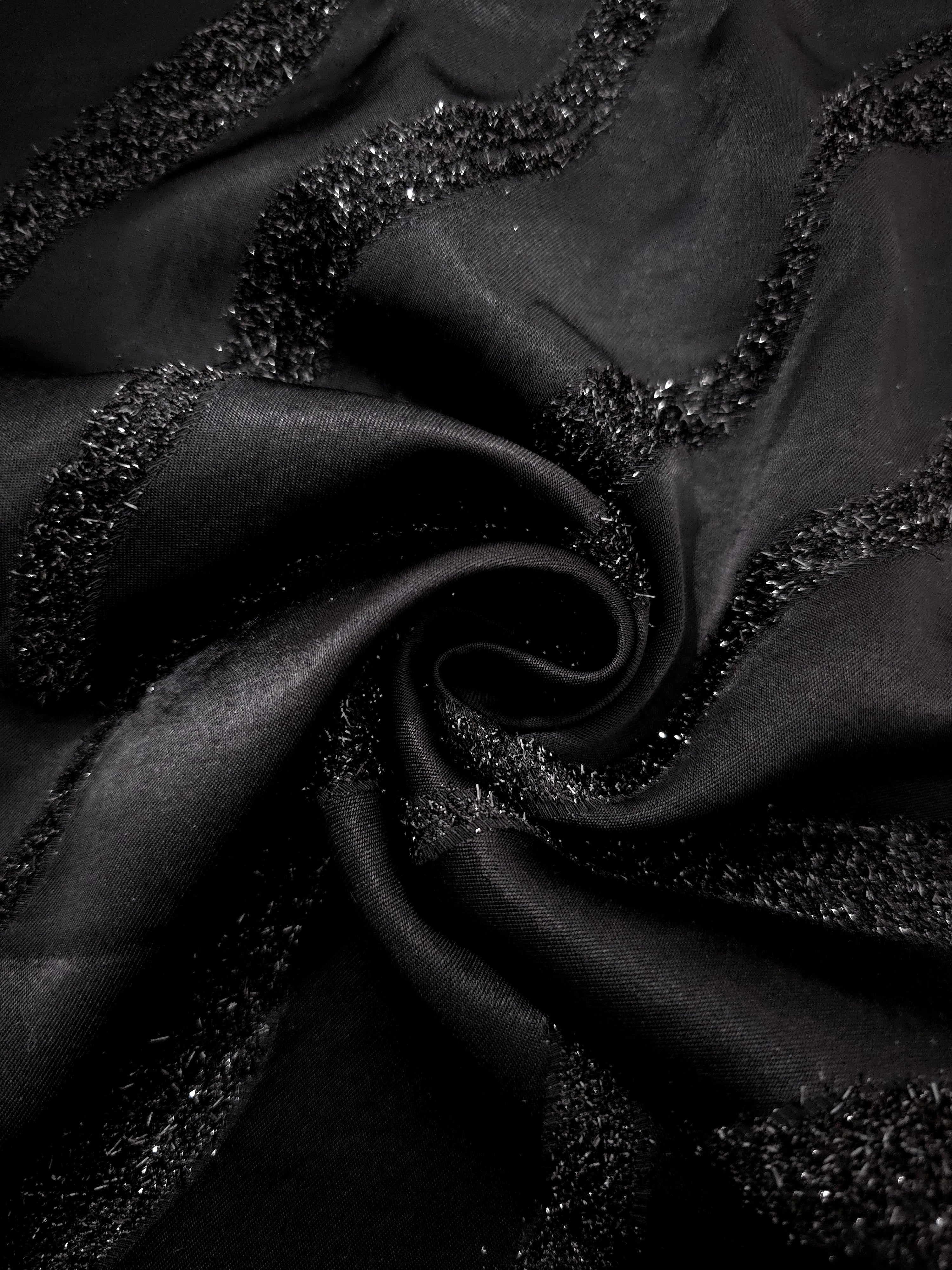 Folded Metallic Black viscose jacquard fabric with organic metallic wave motif