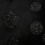 Draped Metallic Black viscose jacquard fabric with reflective confetti dot pattern