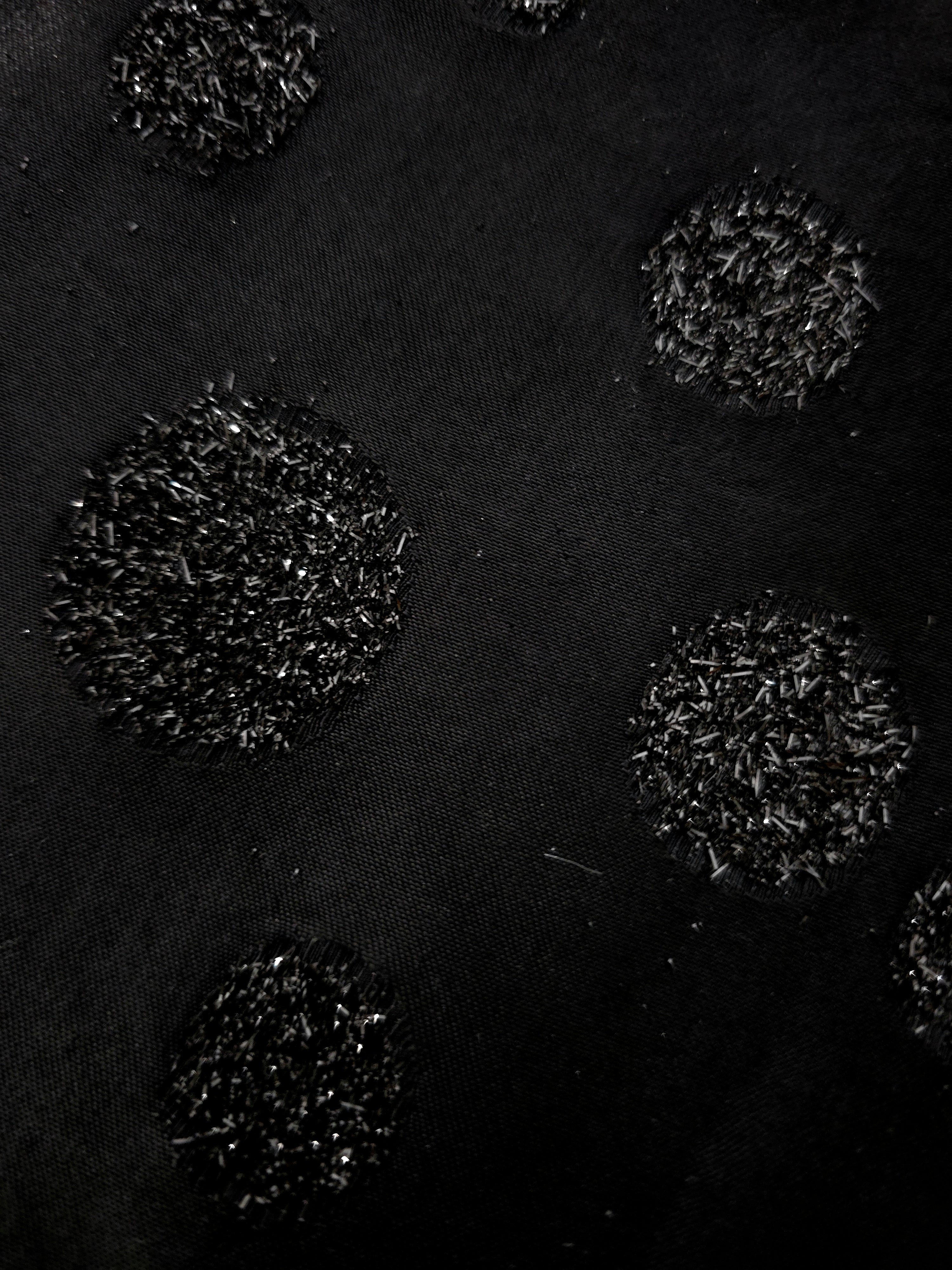 Draped Metallic Black viscose jacquard fabric with reflective confetti dot pattern