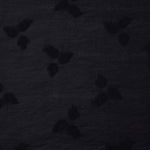 Wide view of formal black small leaf embossed viscose jacquard fabric with raised motif.