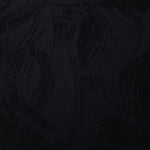 Black arc brushstroke lyocell viscose jacquard with tonal abstract pattern for dresses.