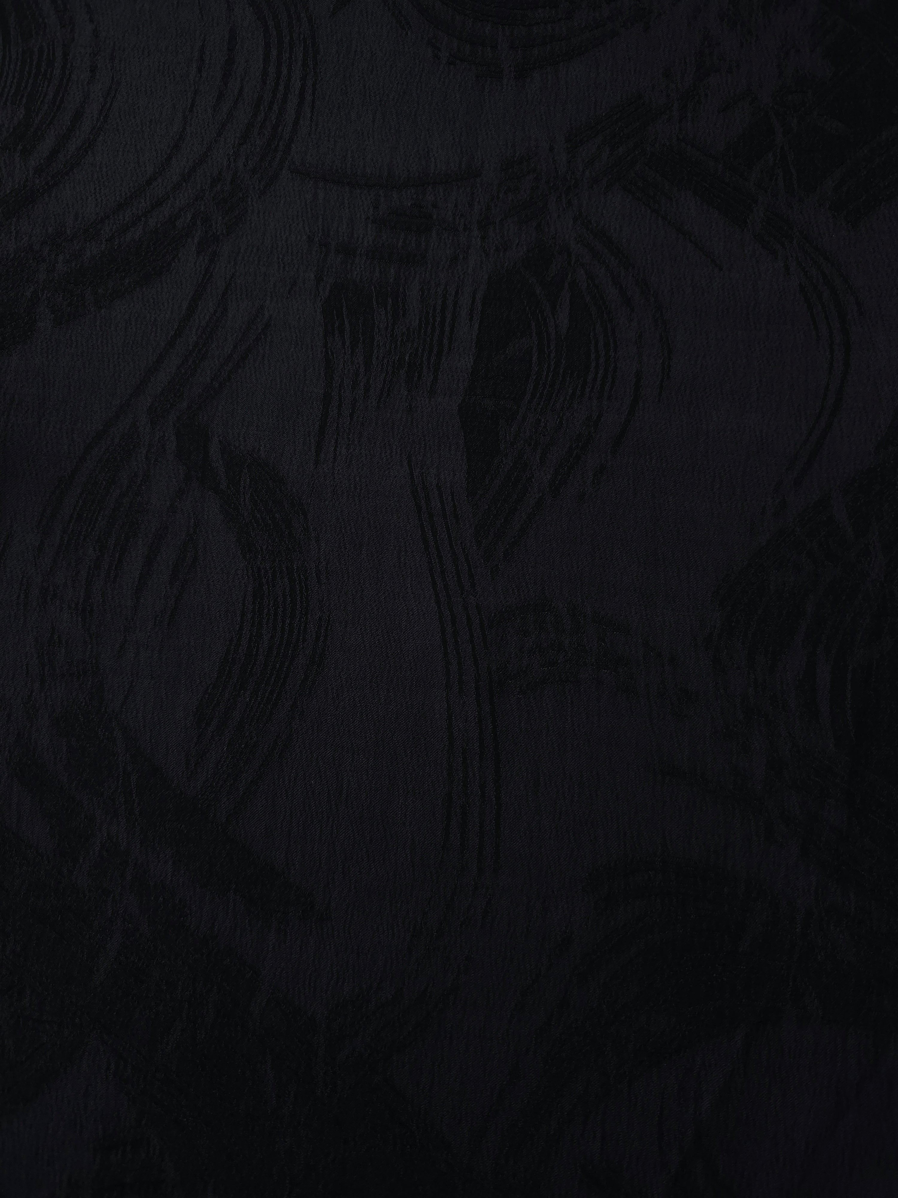 Black arc brushstroke lyocell viscose jacquard with tonal abstract pattern for dresses.
