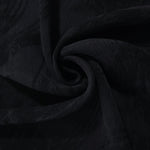 Swirl drape of black abstract brushstroke jacquard with soft woven contrast.