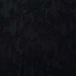 Black botanical floral lyocell viscose jacquard with tonal woven pattern for dresses.